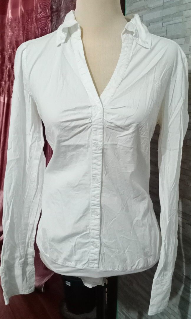 White Longsleeves Bodysuit EDC (Category: Longsleeves) located in Makati City. Submitted by decluttering_stuff101 (Listing ID 1362753938, Image 1). Description: Medium to large.
