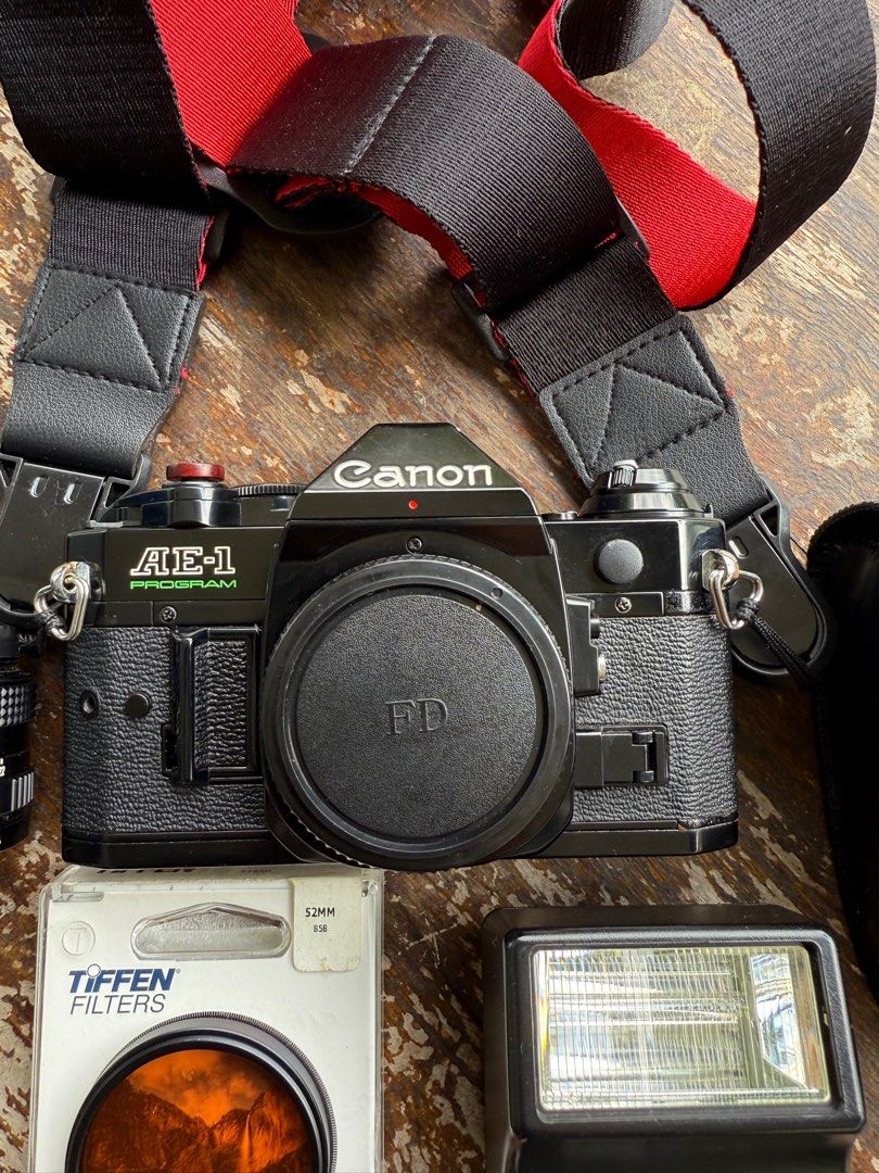 CANON AE1-PROGRAM (Category: Cameras) located in Kuala Lumpur. Submitted by kittf (Listing ID 1366637835, Image 2). Description: CANON AE1-PROGRAM for sale. Include: 1. Lens FD 50mm f1.8 2. Body on mint condition 8/10 3. Viewfinder clear 4. Add ons: Canon speedlite with bag RM 150 9/10.