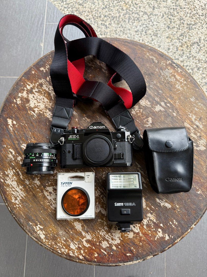CANON AE1-PROGRAM (Category: Cameras) located in Kuala Lumpur. Submitted by kittf (Listing ID 1366637835, Image 1). Description: CANON AE1-PROGRAM for sale. Include: 1. Lens FD 50mm f1.8 2. Body on mint condition 8/10 3. Viewfinder clear 4. Add ons: Canon speedlite with bag RM 150 9/10.