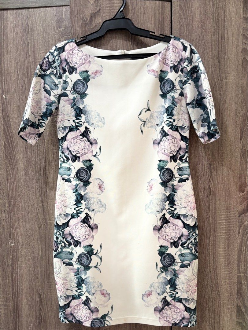ENSEMBLES FLORAL DRESS (Category: Dresses) located in Quezon City. Submitted by mariapreloveditems (Listing ID 1355361707, Image 1). Description: Floral white bodycon dress Ensembles brand Flaws: stained Size: Small.