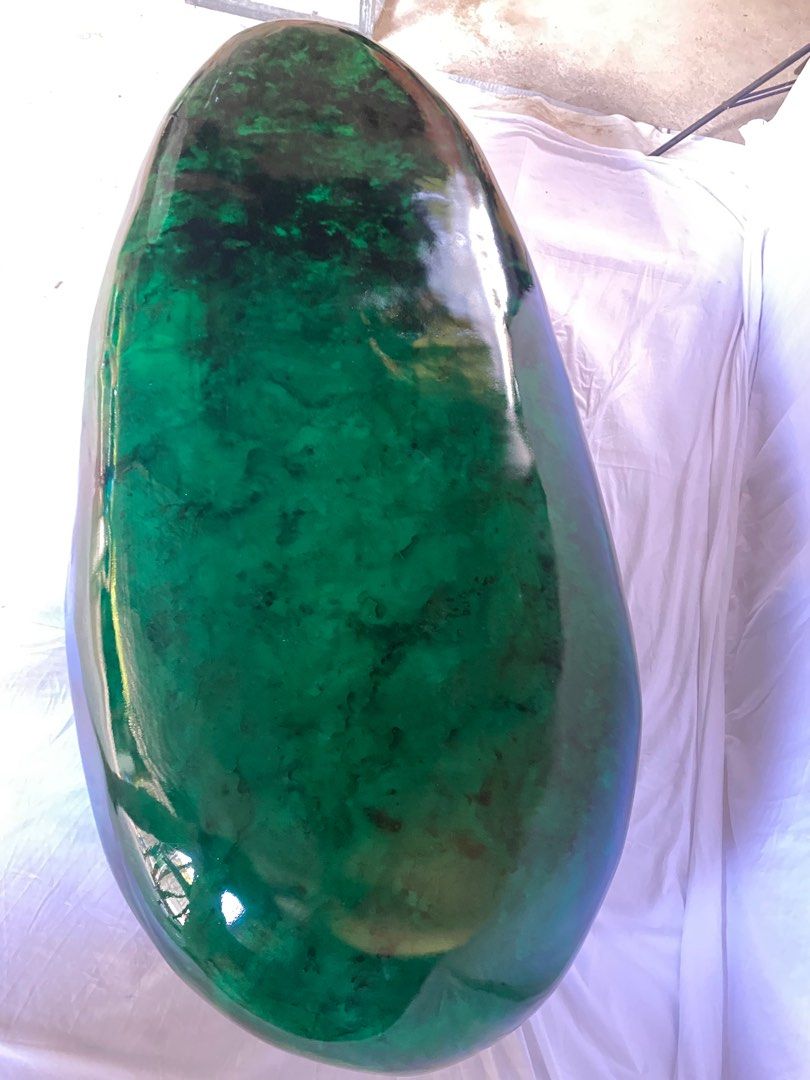 Epoxy bench/table hand painted. 200cm long (Category: Other Home Furniture) located in Makati City. Submitted by olxph_299450477 (Listing ID 1366700870, Image 3). Description: This green pebble shaped stone measures 200cm long and has a height of 45cm and can be used in as well as outdoors. This piece can be used as a bench or a center table. It is made of 6 layers of epoxy which are individually painted with transparent green shades and black to