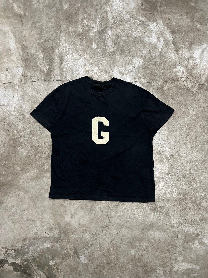 Fear Of God G Logo Heavy Cotton T-Shirt (Category: Tshirts & Polo Shirts ) located in Naga. Submitted by nowhere_archive_shop (Listing ID 1366712650, Image 1). Description: Fear Of God G Logo Heavy Cotton T-Shirt S On Tag 22/26.5 Good Condition Minimal Crackprints DM.