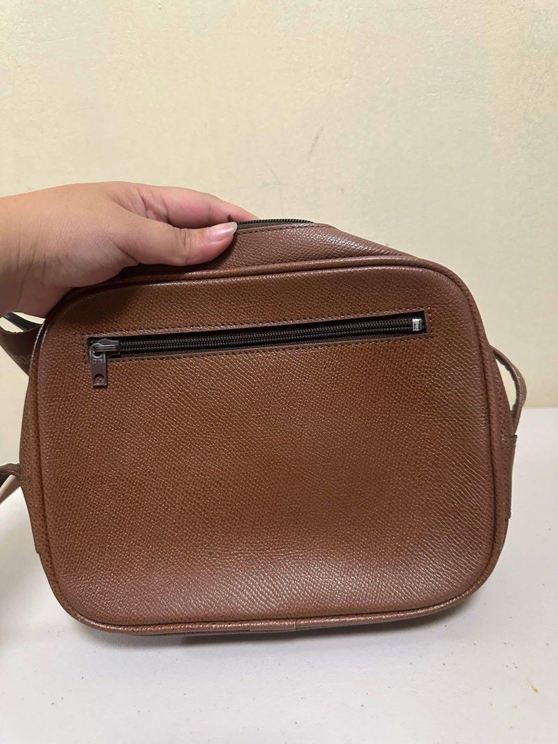 Guaranteed original 💯💯💯 Renoma Sling bag (Category: Luxury Bags & Wallets) located in Quezon City. Submitted by jhaediah (Listing ID 1366729496, Image 3). Description: Guaranteed original 💯💯💯 Renoma Sling bag No flaws **please check photos for your reference ❗️PLEASE MANAGE YOUR EXPECTATIONS AS YOU WERE BUYING PRELOVED ITEMS. ❌❌ no return & no exchange.