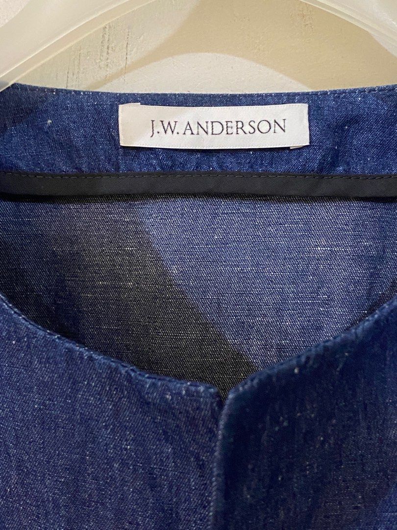 JW Anderson Jacket (Category: Luxury Apparel) located in Pasig City. Submitted by capsulecollection (Listing ID 1366711448, Image 3). Description: JW Anderson round neck jacket Indigo blue color Silver finish brooch accent Oversized fit Size US 36 Made in Poland.