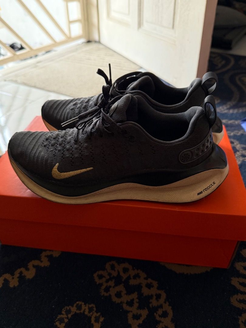 Nike Reactx Infinity Run 4 (Category: Sneakers) located in Ampang. Submitted by yattfadzil (Listing ID 1366638014, Image 2). Description: Use for office wear only. Condition 9.5/10. Colour black and nike logo in gold colour. Good cushioning. .