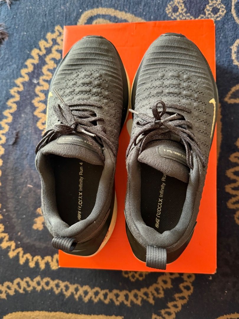 Nike Reactx Infinity Run 4 (Category: Sneakers) located in Ampang. Submitted by yattfadzil (Listing ID 1366638014, Image 3). Description: Use for office wear only. Condition 9.5/10. Colour black and nike logo in gold colour. Good cushioning. .