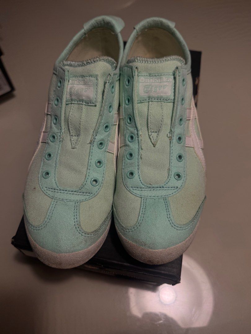 Onitsuka Tiger Mexico 66 Slip-on Mint (Category: Sneakers) located in Las Pinas. Submitted by masd0923 (Listing ID 1366681825, Image 1). Description: This is a slip-on and bought it in Glorietta. With original box. Size 6 and 1/2 US Women. Slightly negotiable. Just needs cleaning then it looks good as new.