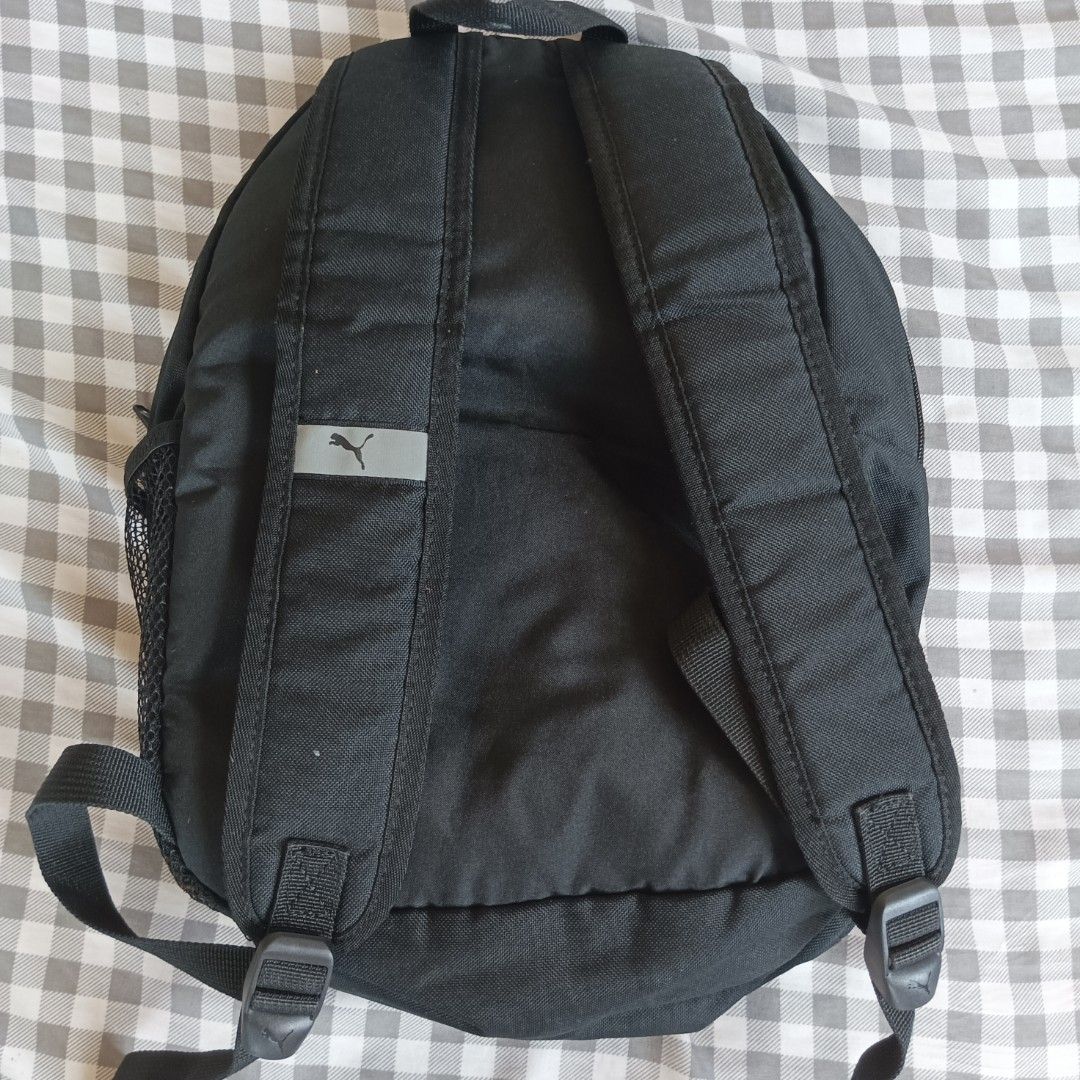 Orginal Puma Black Backpack (Category: Backpacks) located in Masantol. Submitted by chumfairy (Listing ID 1366569690, Image 3). Description: Honest flaw: cracks sa PUMA logo but overall like new Small Size Length: 15" Width: 11".