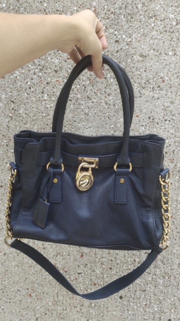 Original MK Hamilton in Navy Blue Color (Category: Luxury Bags & Wallets) located in Cavite. Submitted by MLstore (Listing ID 1366579289, Image 2). Description: Original MK Hamilton in Navy Blue Color 📸 actual picture posted preloved item need to detash bags.
