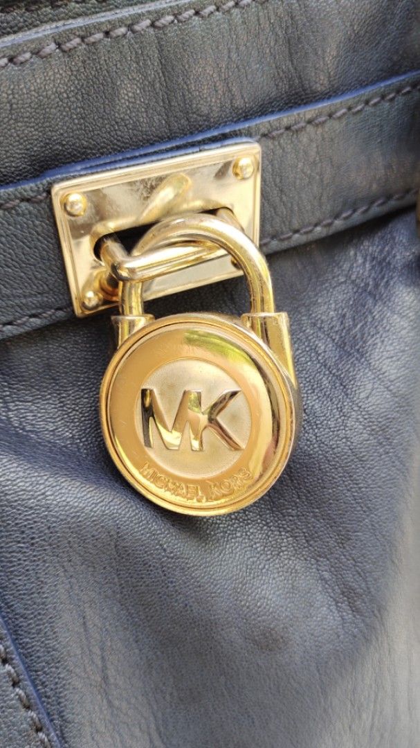 Original MK Hamilton in Navy Blue Color (Category: Luxury Bags & Wallets) located in Cavite. Submitted by MLstore (Listing ID 1366579289, Image 3). Description: Original MK Hamilton in Navy Blue Color 📸 actual picture posted preloved item need to detash bags.