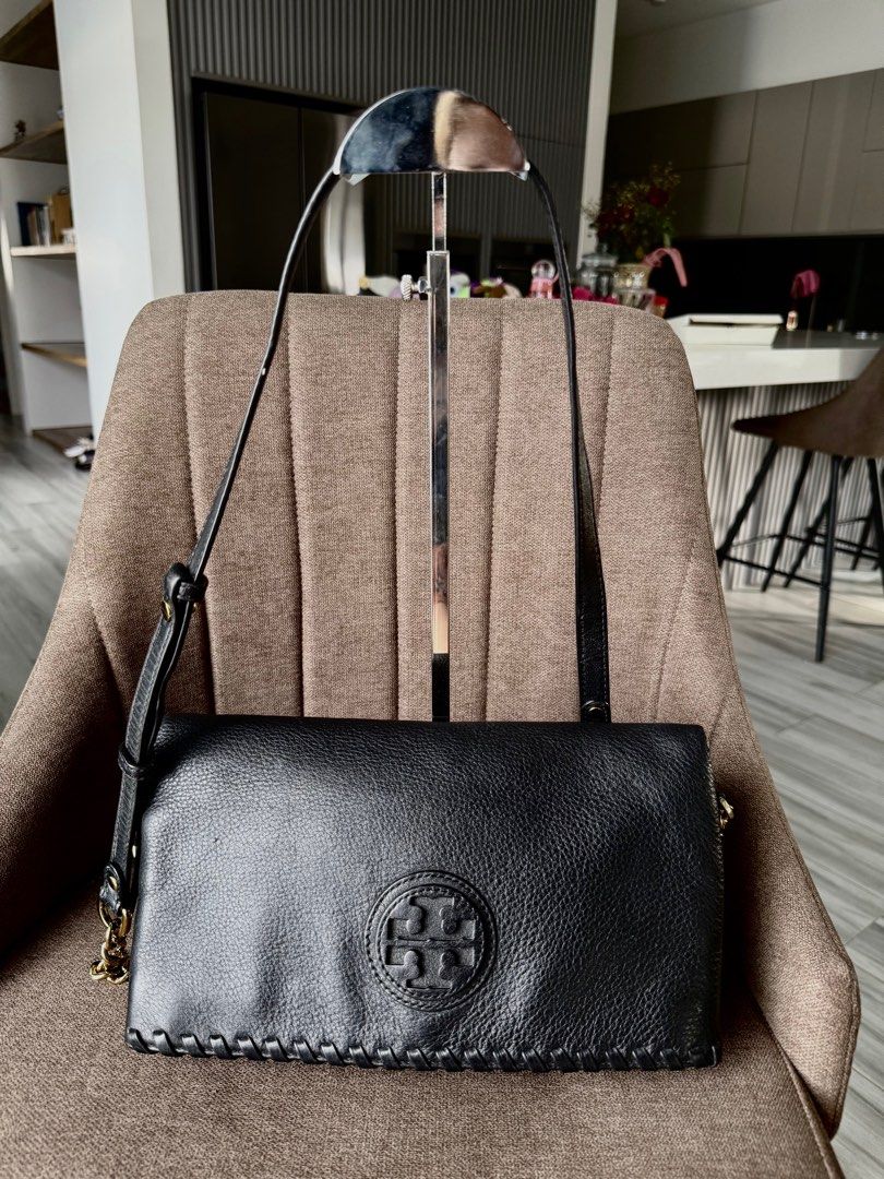 Original tory burch (Category: Luxury Bags & Wallets) located in Tangub. Submitted by christinevillegas (Listing ID 1366610725, Image 1). Description: Original tory burch sling replaced sling strap May sign of use check photos.