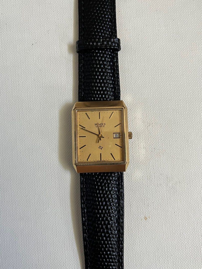 Rado tank gold plated quartz (Category: Luxury Watches) located in Cainta. Submitted by saminjess (Listing ID 1366596947, Image 3). Description: Rado tank gold plated quartz Replaced leather strap Watch only Minimal signs of use ₱7,000 NEGO Lic: cainta, rizal.