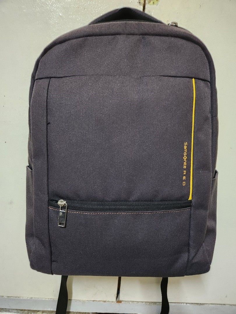 SAMSONITE RED LIGHTWEIGHT BACKPACK (Category: Backpacks) located in Taguig. Submitted by starbucksph (Listing ID 1366622400, Image 1). Description: SAMSONITE RED LIGHTWEIGHT BACKPACK color rate 7/10 one puller missing, double zip naman.