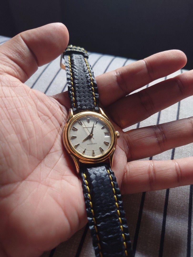 Selling HAMILTON 6234 Black Skeleton with Date (Category: Men's Watches) located in Makati City. Submitted by yungkatabiko (Listing ID 1366667240, Image 2). Description: ■Product name Hamilton 6234 Automatic watch ■Product specifications Case material: Stainless steel Case color: Gold Dial color: White Case Size (approx.): W32.1mm (excluding crown) x H42.7mm (including lugs) Thickness: 10.9mm Case size: Approximately 34mm (excluding crown) Moveme