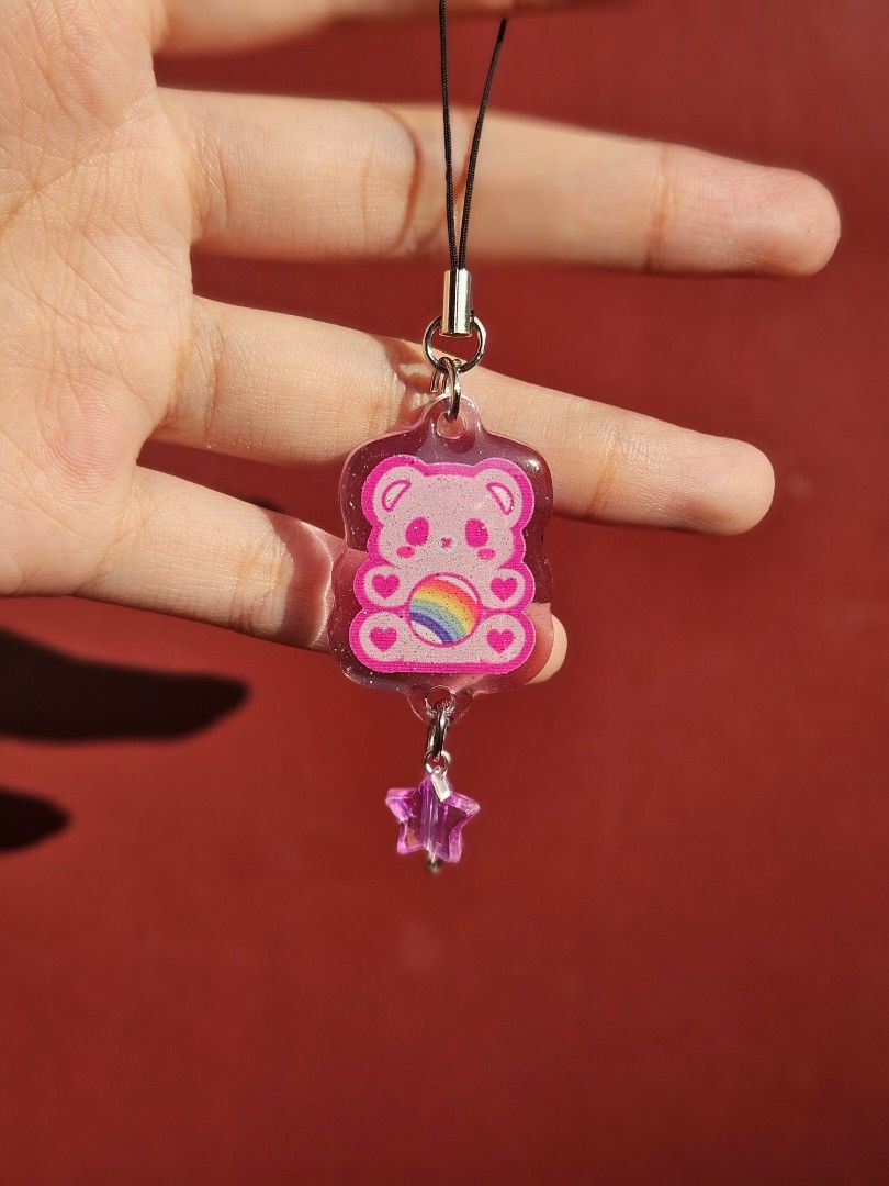 Care bear keychain phone charms (Category: Character Goods) located in Valenzuela. Submitted by itemsforless22 (Listing ID 1368333842, Image 1). Description: 100 per piece CARE BEARY GLITTER KEYCHAIN.