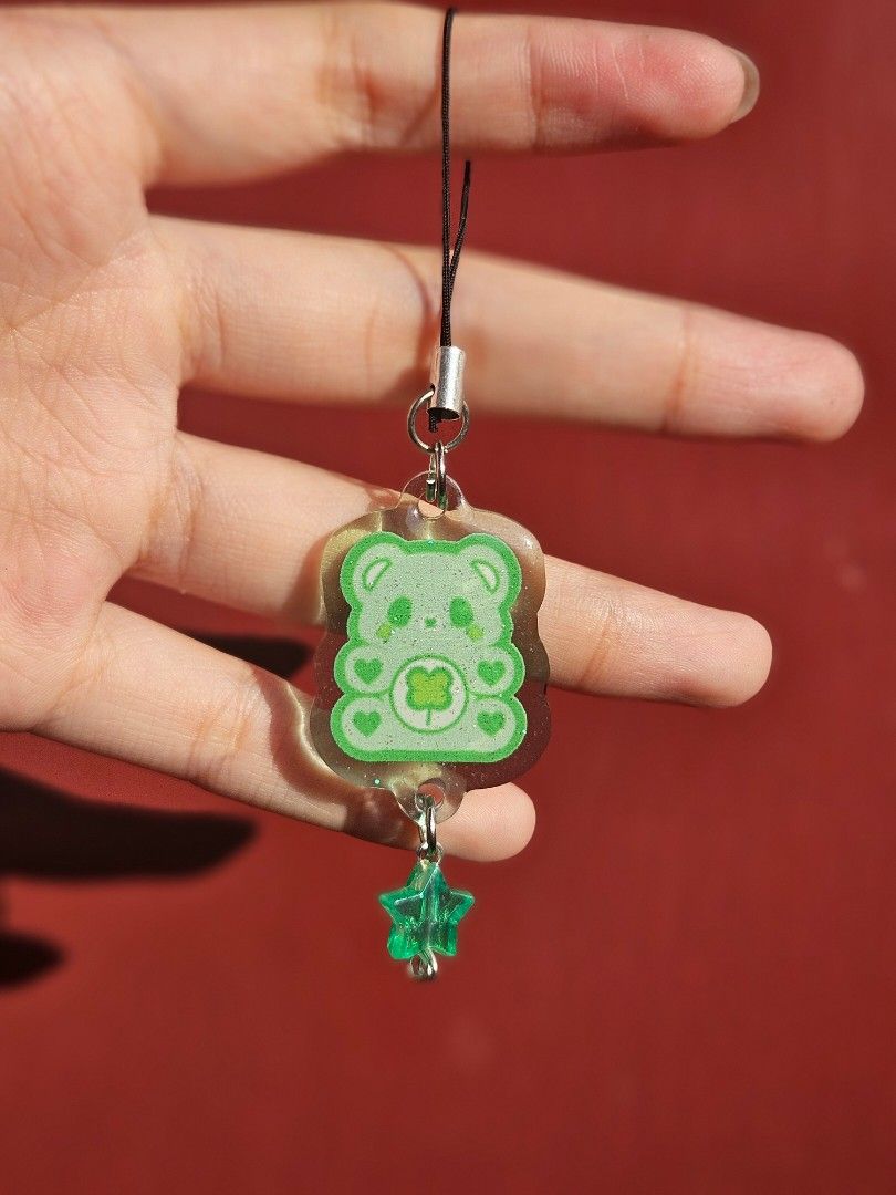 Care bear keychain phone charms (Category: Character Goods) located in Valenzuela. Submitted by itemsforless22 (Listing ID 1368333842, Image 3). Description: 100 per piece CARE BEARY GLITTER KEYCHAIN.