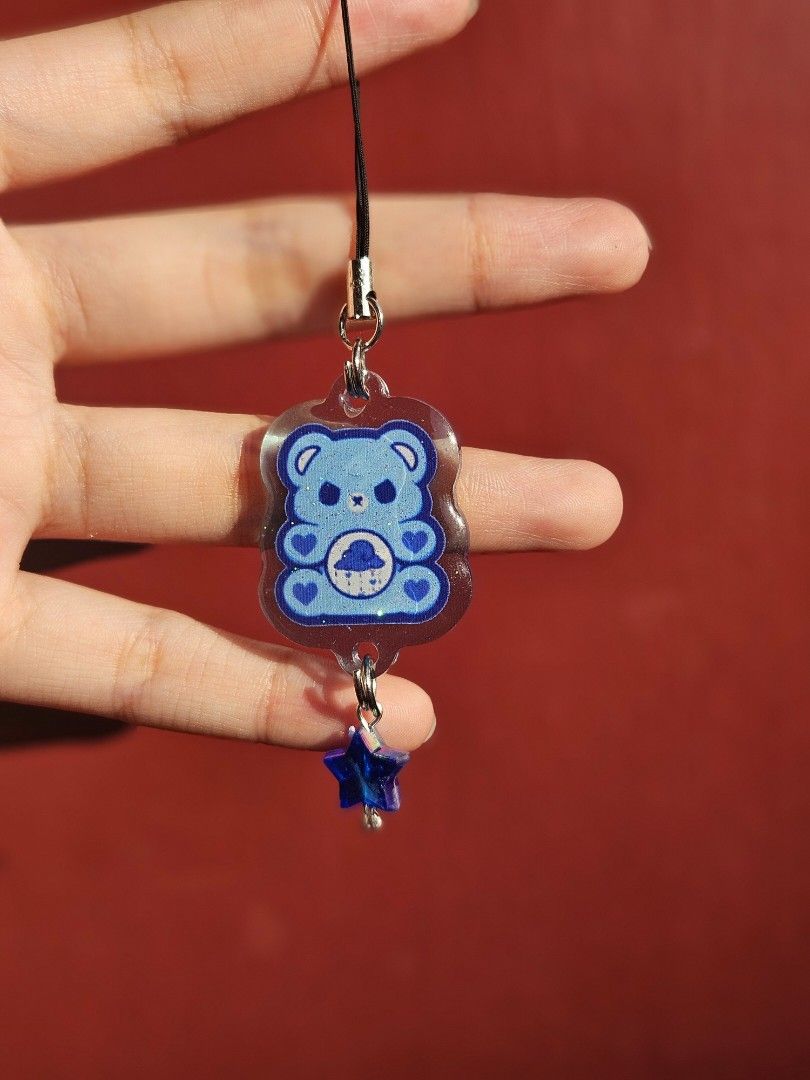 Care bear keychain phone charms (Category: Character Goods) located in Valenzuela. Submitted by itemsforless22 (Listing ID 1368333842, Image 2). Description: 100 per piece CARE BEARY GLITTER KEYCHAIN.