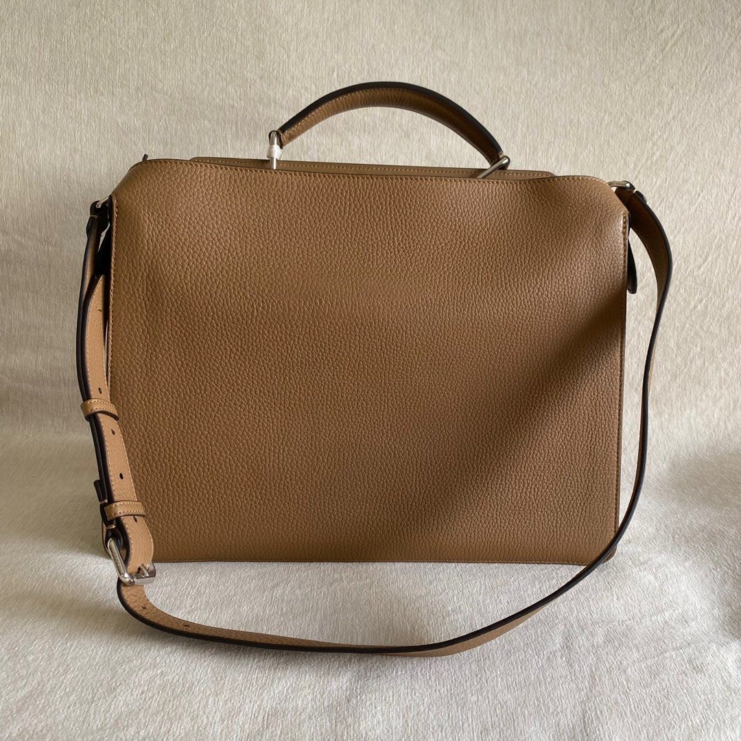 Fendi Peekaboo ISeeU Bag (Category: Briefcases) located in Quezon City. Submitted by nikknacks (Listing ID 1368349534, Image 2). Description: Fendi Peekaboo ISeeU Bag ✅Medium size ✅Calfskin leather ✅The interior is organized into two compartments divided by a stiff partition ✅Palladium-finish metalware ✅Can be carried by hand or on the shoulder ✅With adjustable, detachable shoulder strap 🇮🇹Made in Italy ✅Measurements Height : 34 cm Depth : 12 c