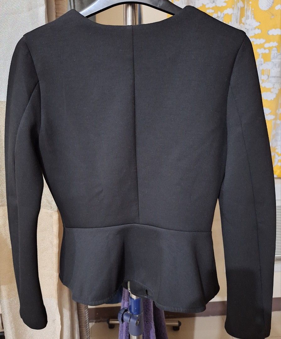 H&M Divided Black Zipped up Peplum Jacket (Category: Coats, Jackets and Outerwear) located in Makati City. Submitted by worn2work_treasures (Listing ID 1368285808, Image 3). Description: >Material is stretchy (10%Rayon &6% Spandex) >Length - 21 inches from the nexckline >Shoulder to shoulder width - 14 inches >Bust side to side width - 16 inches >Arms - 5.5 inches.
