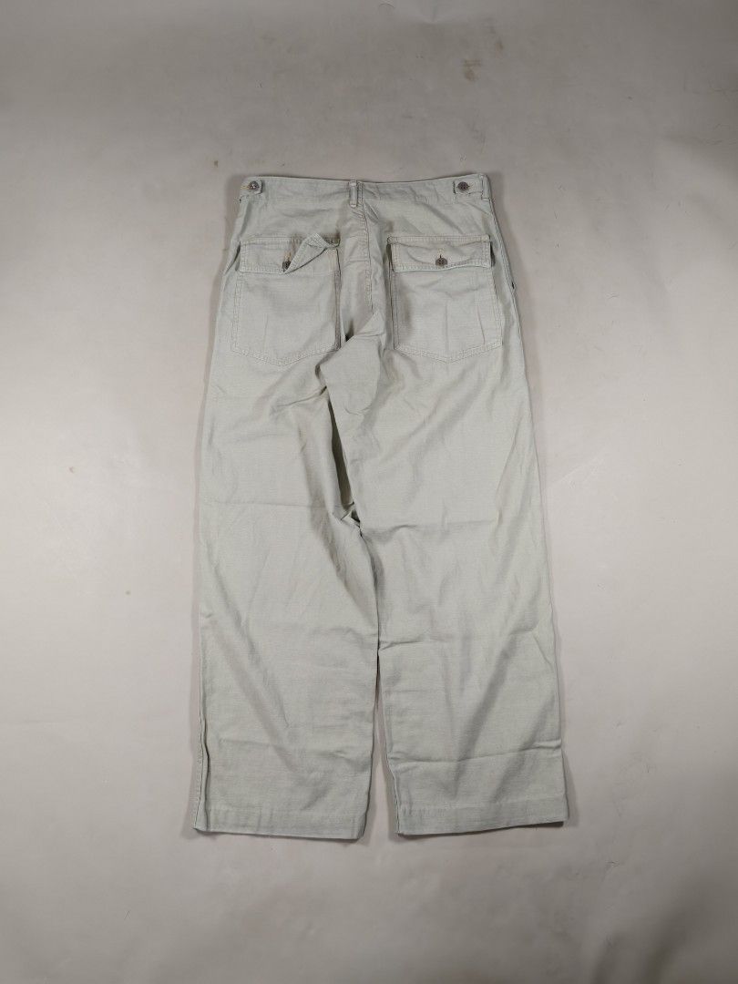Nepenthes Hoggs Utility Baker Pants - Light Beige (Category: Trousers) located in Roxas City. Submitted by fadesandpatinas (Listing ID 1368366281, Image 2). Description: Nepenthes Hoggs Utility Baker Pants - Light Beige Tagged Large Fits 32-33" Measurements: Waist - 16.3" Rise - 12.5" Thighs - 12.5" Inseam - 28.7" Length - 39.5" Hem - 9.8" A unique twist on a military staple, the Hoggs Utility Baker Pants by Nepenthes reinterprets the classic OG-