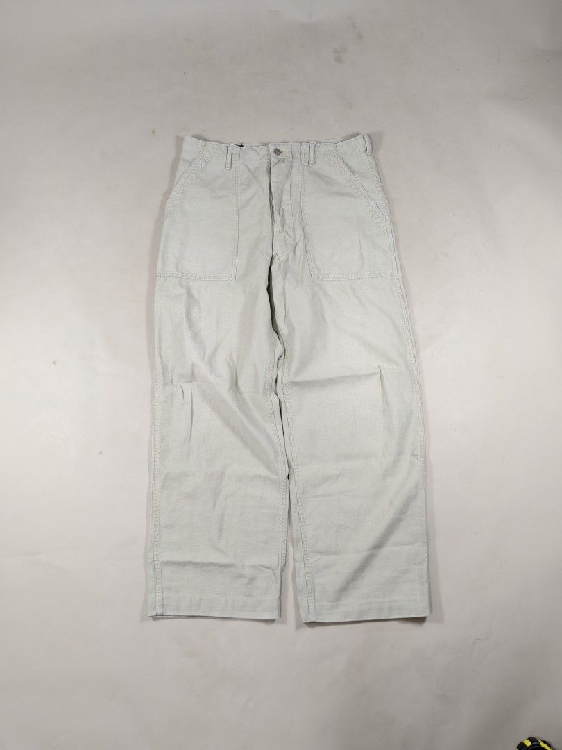 Nepenthes Hoggs Utility Baker Pants - Light Beige (Category: Trousers) located in Roxas City. Submitted by fadesandpatinas (Listing ID 1368366281, Image 1). Description: Nepenthes Hoggs Utility Baker Pants - Light Beige Tagged Large Fits 32-33" Measurements: Waist - 16.3" Rise - 12.5" Thighs - 12.5" Inseam - 28.7" Length - 39.5" Hem - 9.8" A unique twist on a military staple, the Hoggs Utility Baker Pants by Nepenthes reinterprets the classic OG-