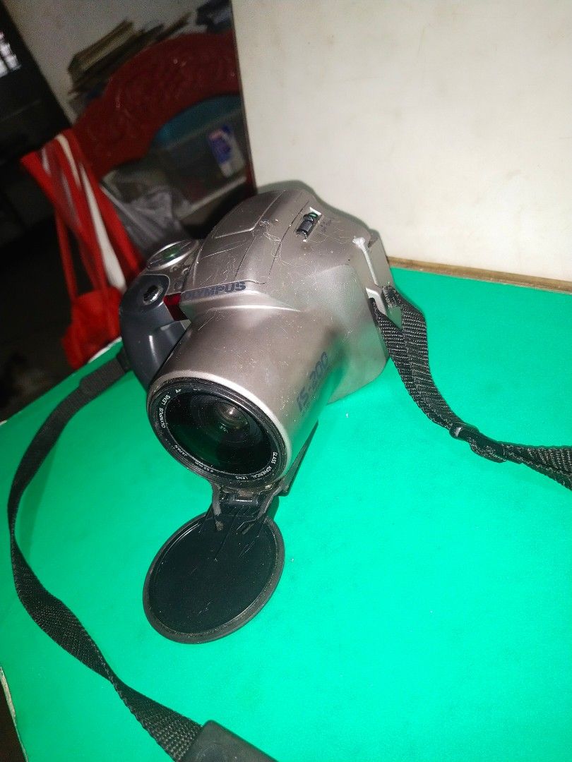 OLYMPUS 28-110 Camera/As Is/Not Working/UNTESTED (Category: Cameras) located in Del Monte. Submitted by zurckram777 (Listing ID 1368307330, Image 2). Description: Olympus 28-110. Digital camera that uses 35 mm film. Not working. AS IS. UNTESTED. JAPAN. Good as a restoration project. Lens cover is quite unique because it swivels down or up. Original 35 mm film is still inside. Nice display,too. Bahala na po kayo mag restore or get parts. In POOR c