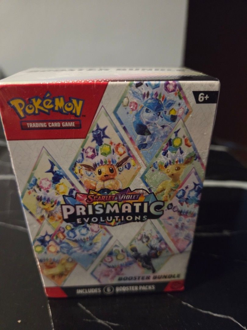 Prismatic Evolution Booster Bundle (Category: Toys & Games) located in Singapore. Submitted by lawrence.bosco (Listing ID 1368296333, Image 1). Description: .