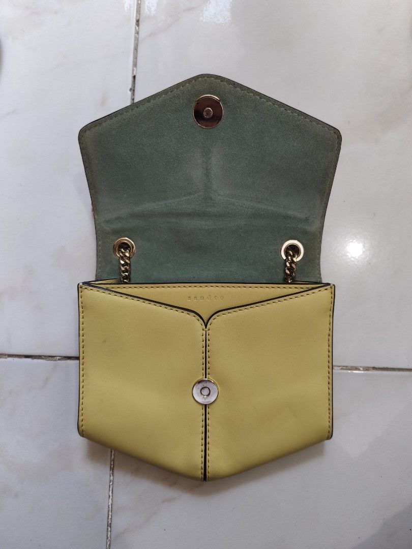 Sandro Paris Bag (Category: Luxury Bags & Wallets) located in Baguio. Submitted by gandita.28 (Listing ID 1368243446, Image 2). Description: Sandro mini Lou cross body bag in yellow Needs Cleaning No issues Browse photos for length and width 2499 free Ship.