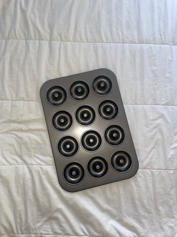12-slot donut pan (Category: Bakeware) located in Manila. Submitted by wakeuplittlerosebud (Listing ID 1368419491, Image 1). Description: make your own donuts or bagels at home 🍩🥯 will wash before delivering! .