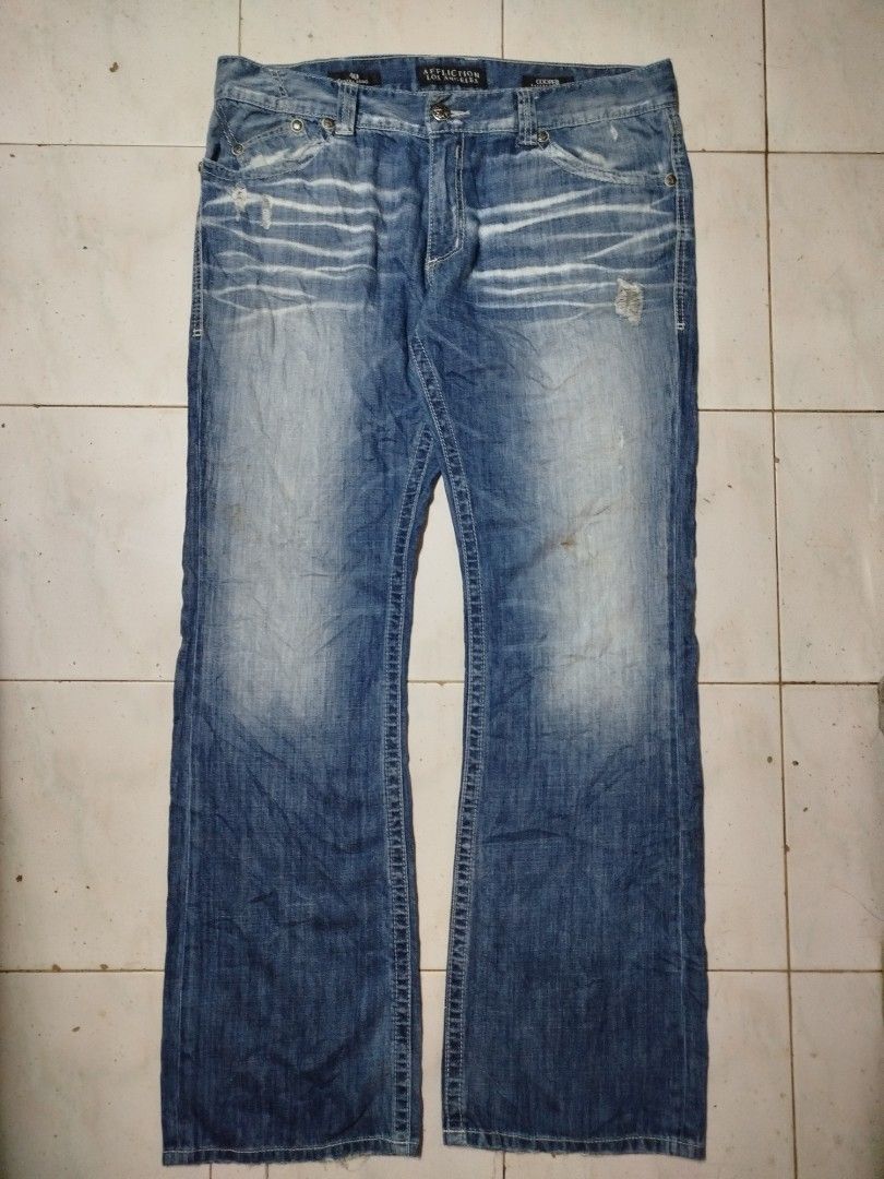 Affliction Blue Jeans (Category: Jeans) located in San Juan City. Submitted by reddvelasquez4298 (Listing ID 1368446452, Image 1). Description: Affliction Blue Jeans Cooper Relaxed Boot Distressed Size 40-41 Waistline 46.5 Length Thigh 11 Leg Opening 10.5 Good Condition May washable stains, check photos. 😊 1750 pesos PM.