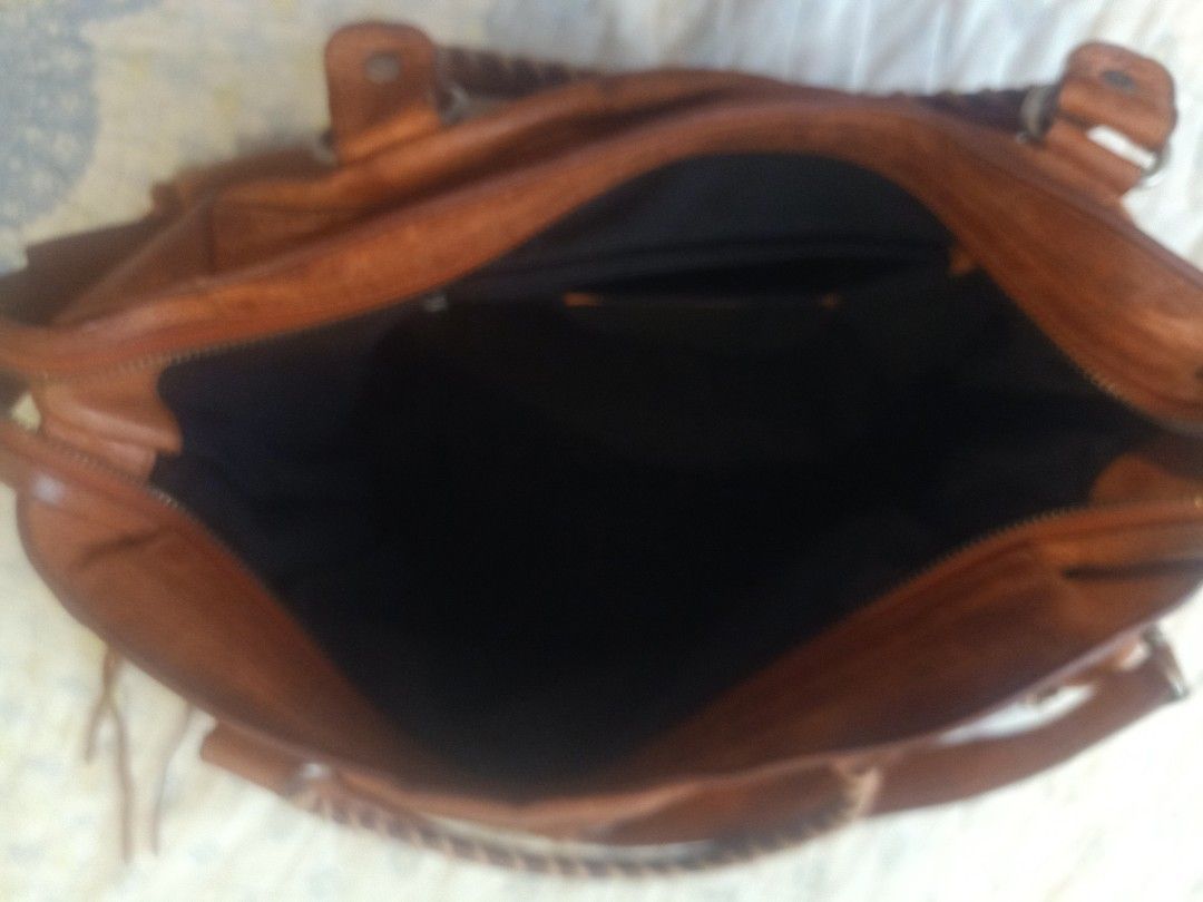 Balenciaga (Category: Luxury Bags & Wallets) located in Cainta. Submitted by belli_phats (Listing ID 1293014542, Image 3). Description: water marks stains need recolor project bag No Return, Refund or Exchange of item.