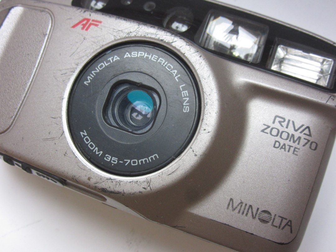 Minolta riva zoom 70 date (Category: Cameras) located in Las Pinas. Submitted by film101 (Listing ID 1368524138, Image 3). Description: Minolta Riva zoom date Tested with dummy film rolls Its a shelltype camera with stunning lens 35-70 aspherical lens Its everthing working good With some hairline scratches in the body noticeable -run by CR123A not incl Condition of camera -shutter working -flash working -lcd no bleed -buttons working -cosmetics s