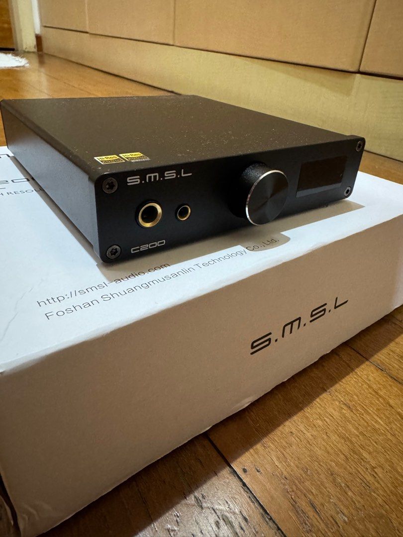 SMSL C200 DAC Headphone amplifier (Category: Soundbars, Speakers & Amplifiers) located in Singapore. Submitted by seller9991 (Listing ID 1368563213, Image 2). Description: Mint condition headphone amplifier. Used it less than 10 times and left in storage after. Condition is pristine. Comes with - Headphone amp + Box - Power cable - bluetooth receiver - remote control *No usb-c cable with this - ESS Technology high-end D/A chip ES9038Q2M; - Qualco