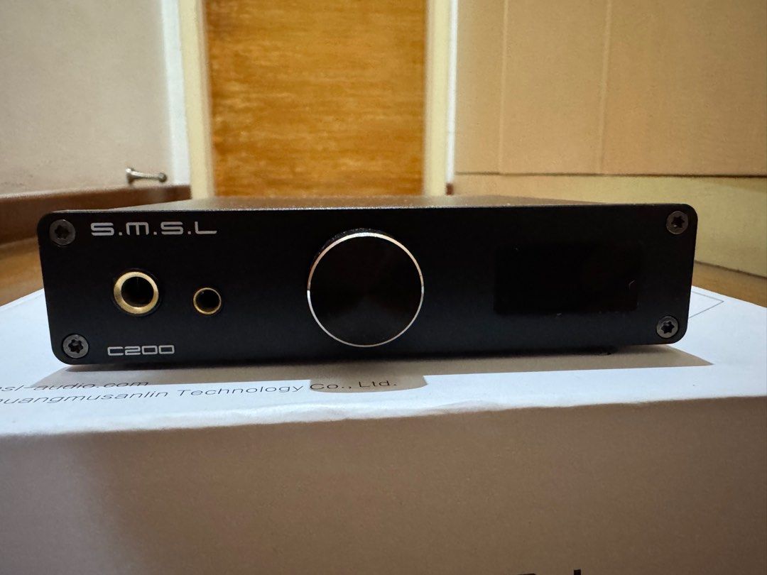 SMSL C200 DAC Headphone amplifier (Category: Soundbars, Speakers & Amplifiers) located in Singapore. Submitted by seller9991 (Listing ID 1368563213, Image 3). Description: Mint condition headphone amplifier. Used it less than 10 times and left in storage after. Condition is pristine. Comes with - Headphone amp + Box - Power cable - bluetooth receiver - remote control *No usb-c cable with this - ESS Technology high-end D/A chip ES9038Q2M; - Qualco