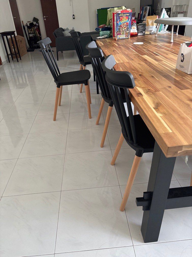 Solid wood table (Category: Tables & Sets) located in Singapore. Submitted by luxel (Listing ID 1368447708, Image 2). Description: This is a table from IKEA - Really really good condition- I’m moving overseas soon so will have to sell it - please see my other listings as well. Paid $800 for this Will take $550 Please arrange transport .