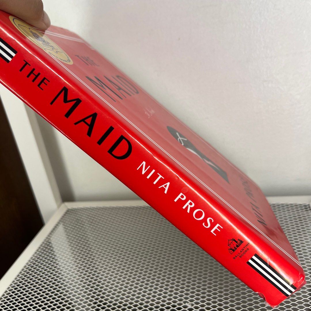 The Maid by Nita Prose (Category: Storybooks) located in Makati City. Submitted by binteji (Listing ID 1368489705, Image 2). Description: Please read Authentic Hardbound Like new condition Has small tear on dust jacket (see third photo) No tanning and no foxing This is a preloved book so please manage your expectations. See photos for the condition of the book..