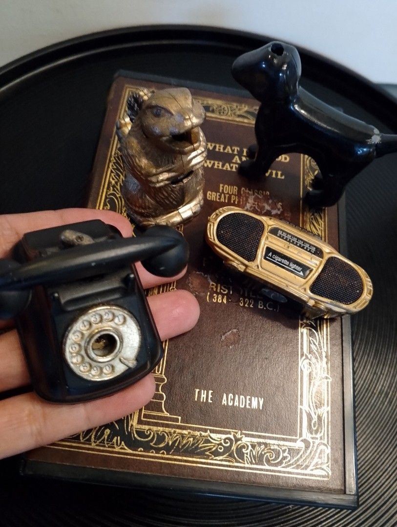 Vintage Die Cast Lighters (Category: Vintage Collectibles) located in Binangonan. Submitted by stufflikedat (Listing ID 1368459493, Image 3). Description: Lot of vintage 5 die-cast gas lighters dog, cassette, telephone and book lighters are all working and needs gas refill, Godzilla lighter needs a new flint or sparkler, take all 5 lighters for 1.8k + shipping.