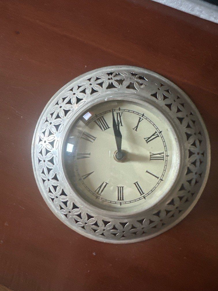 Wall Clock (Category: Clocks) located in Singapore. Submitted by tkapoor (Listing ID 1368487301, Image 1). Description: Wall clock - metal cutwork with beautiful flower pattern.