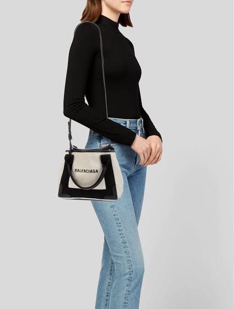 Authentic Balenciaga Cabas XS (Category: Luxury Bags & Wallets) located in Paranaque City. Submitted by jomaaaalones (Listing ID 1368621503, Image 1). Description: For sale good condition no rubs or stain outside comes with dustbag and paperbag. Authentic Guaranteed .