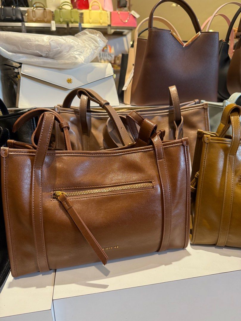 Christy Ng (Category: Shoulder Bags) located in Manila. Submitted by concy (Listing ID 1368718526, Image 2). Description: Original Christy Ng Soft Leather Bag 2 side pockets Open top Snap on closure With dustbag.