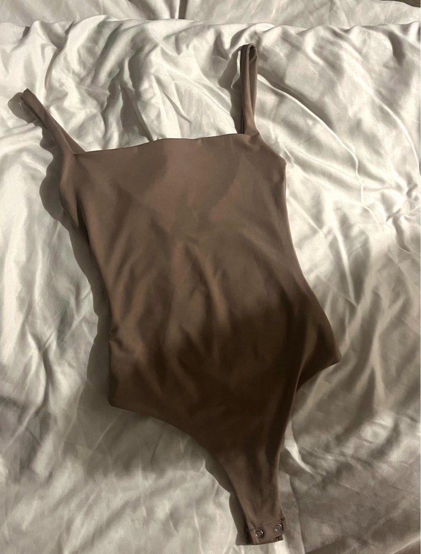 Easy Peasy Cami Bodysuit (XS Latte) (Category: Others Tops) located in Silang. Submitted by miiiich (Listing ID 1368611658, Image 1). Description: Used once. Original price: 599 600 for both easy peasy bodysuit.