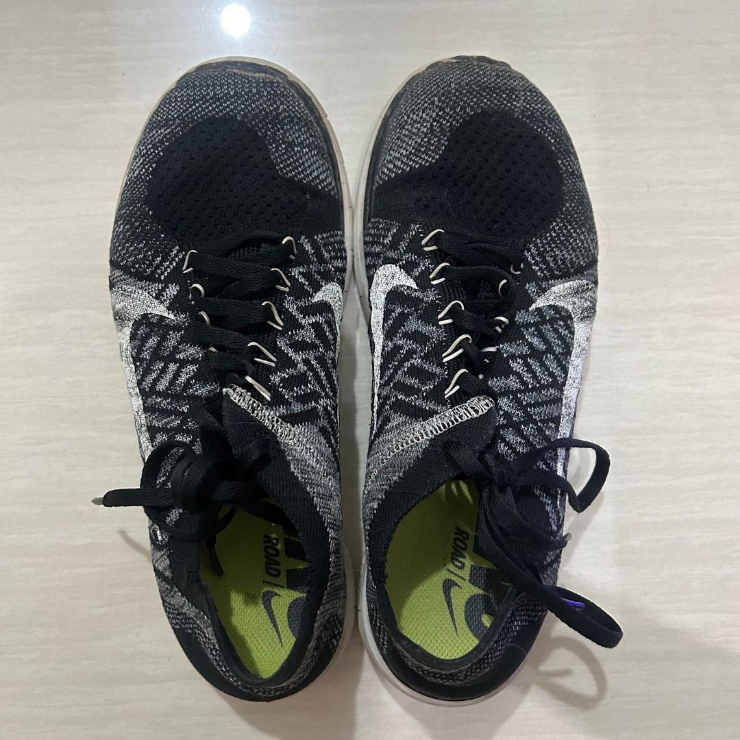 NIKE Black/White Free 4.0 Flyknit Running Shoes (Category: Sneakers) located in Pasig City. Submitted by preloved-by-patty (Listing ID 1368600023, Image 2). Description: - Original price: ₱4,900 - Reason for selling: decluttering - Meet up or delivery.