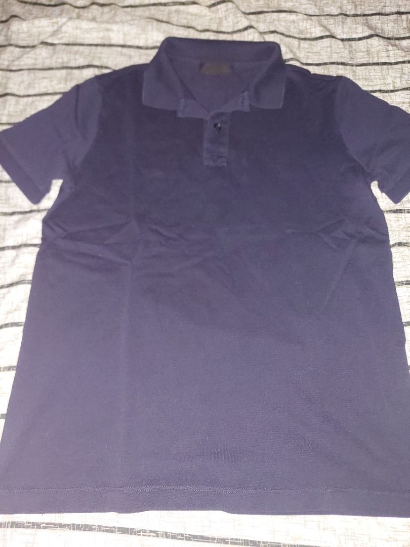 Prada Navy Blue Polo shirt (Category: Tshirts & Polo Shirts ) located in Santa Rosa. Submitted by luxmr65608 (Listing ID 1368658536, Image 3). Description: Plain Prada Polo Shirt (Unisex) Size: Small Excellent condition (used once or twice) Available 2pcs .