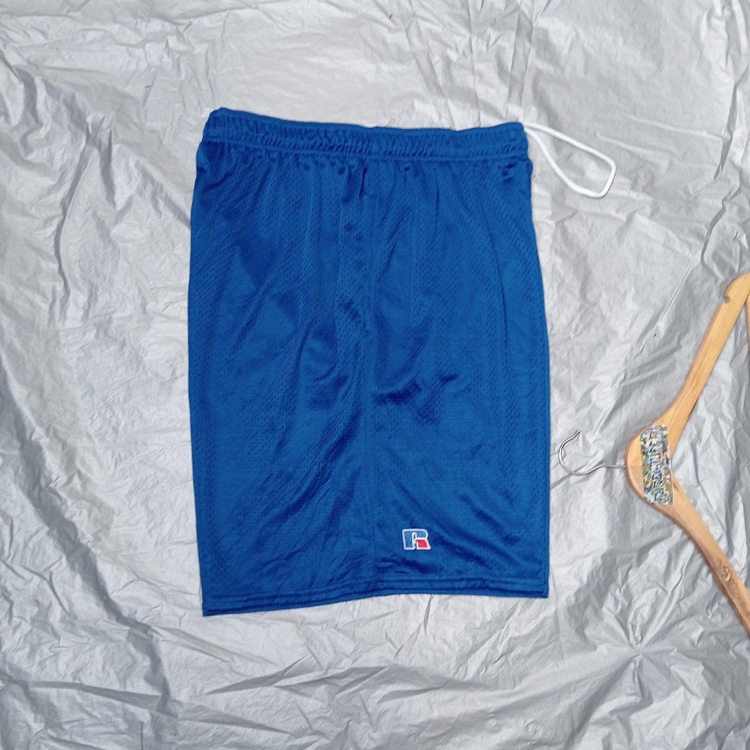Russell Athletic mesh short (Category: Shorts) located in Pili. Submitted by purestuffph (Listing ID 1368757848, Image 3). Description: Russell Athletic blue mesh short size: XL waistline: 30-38 (mahigpit pa garter) length: 20.5 - 21 like new condition 9.5+/10 (solid pa) no issue 400 + shipping fee.