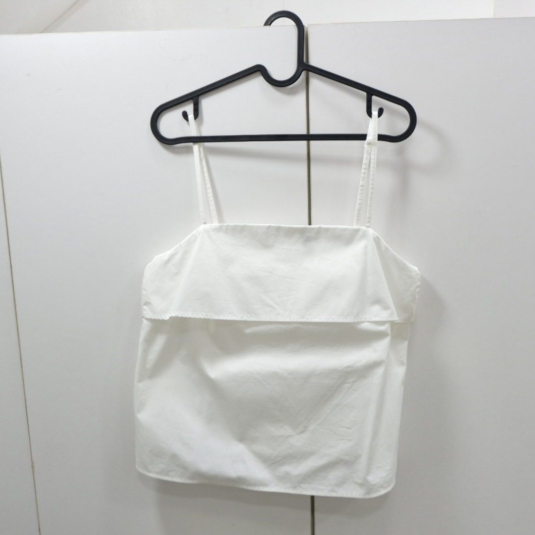 white h&m sleeveless spaghetti blouse top (Category: Sleeveless) located in Santa Ana. Submitted by pagbenta (Listing ID 1368721352, Image 1). Description: • size on tag: medium.