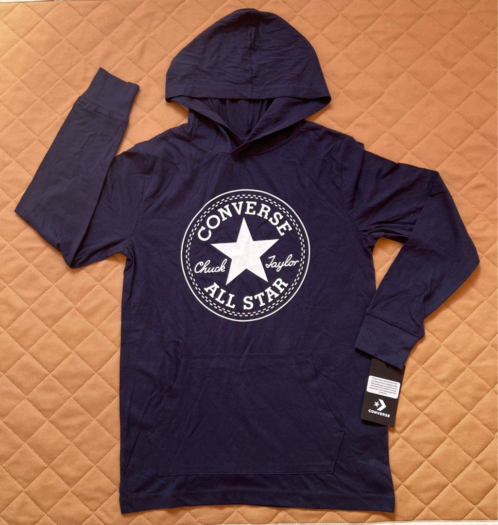Boys Converse All Star Hoodie (Category: Coats, Jackets and Outerwear) located in Silang. Submitted by gloryfindz (Listing ID 1368912765, Image 1). Description: Authentic brand Bought in US Lightweight hoodie Color. Navy blie Size available: M )10-12yo) L )14 yo2.