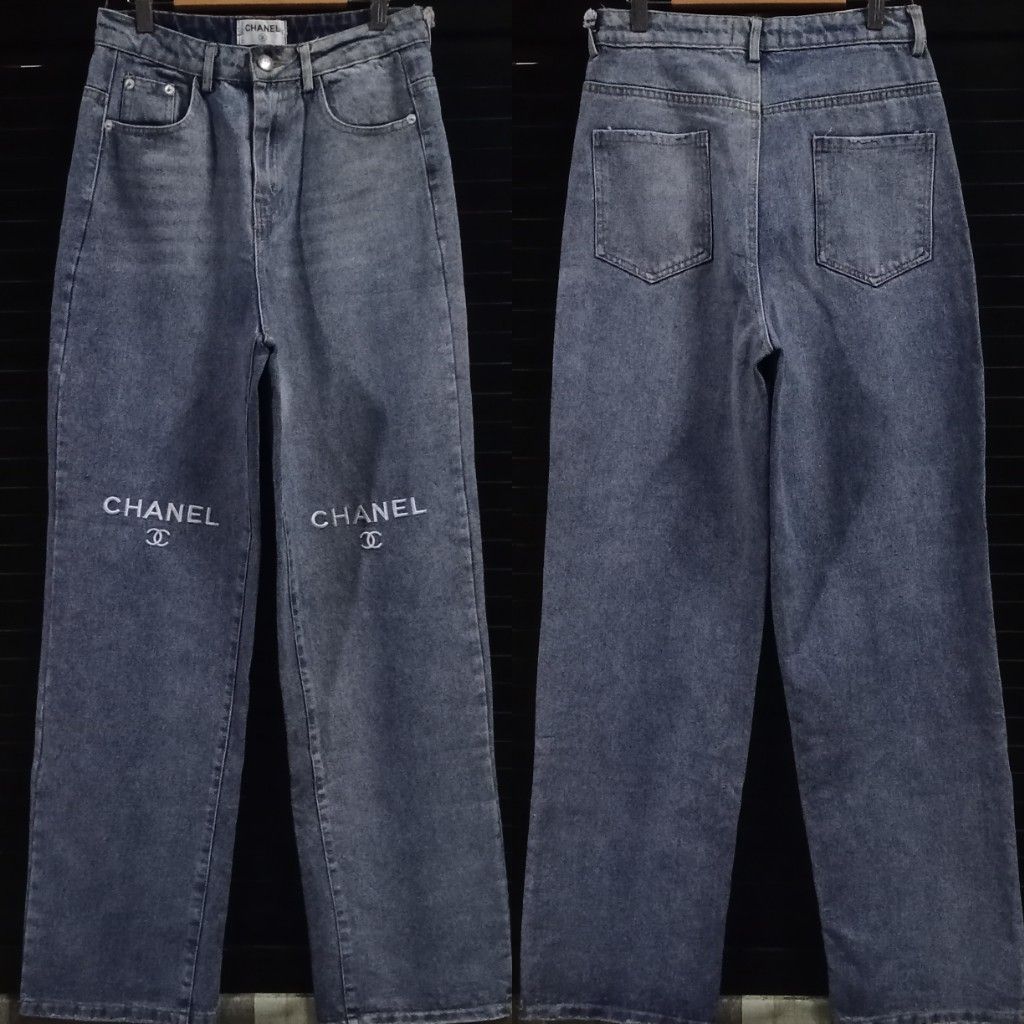 Chanel Embroided Denim Pants (Category: Luxury Apparel) located in Angeles City. Submitted by hoely.faith (Listing ID 1368821769, Image 1). Description: AUTHENTICITY N0T GUARANTEED‼️ BUY AT YOUR OWN RISK‼️ details: - embroided chanel on knee part - engraved brand name on button - semi hard denim condition: excellent condi. color rate: 9/10 issue/s: FLAT LAID DIMES: waistline size (in): 26 via tape measure rise length: 12 leg hole: 8.5 length: 43 