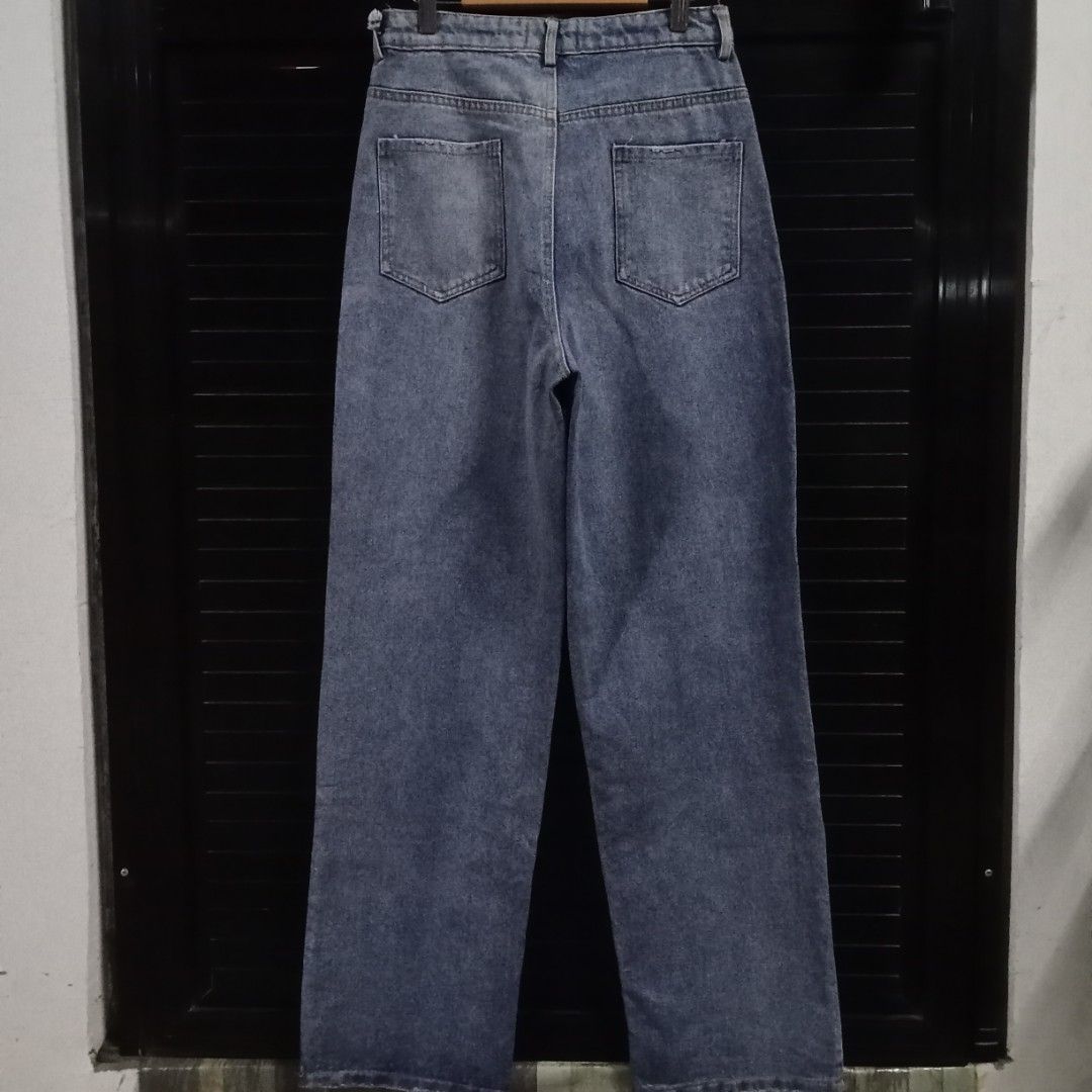 Chanel Embroided Denim Pants (Category: Luxury Apparel) located in Angeles City. Submitted by hoely.faith (Listing ID 1368821769, Image 3). Description: AUTHENTICITY N0T GUARANTEED‼️ BUY AT YOUR OWN RISK‼️ details: - embroided chanel on knee part - engraved brand name on button - semi hard denim condition: excellent condi. color rate: 9/10 issue/s: FLAT LAID DIMES: waistline size (in): 26 via tape measure rise length: 12 leg hole: 8.5 length: 43 