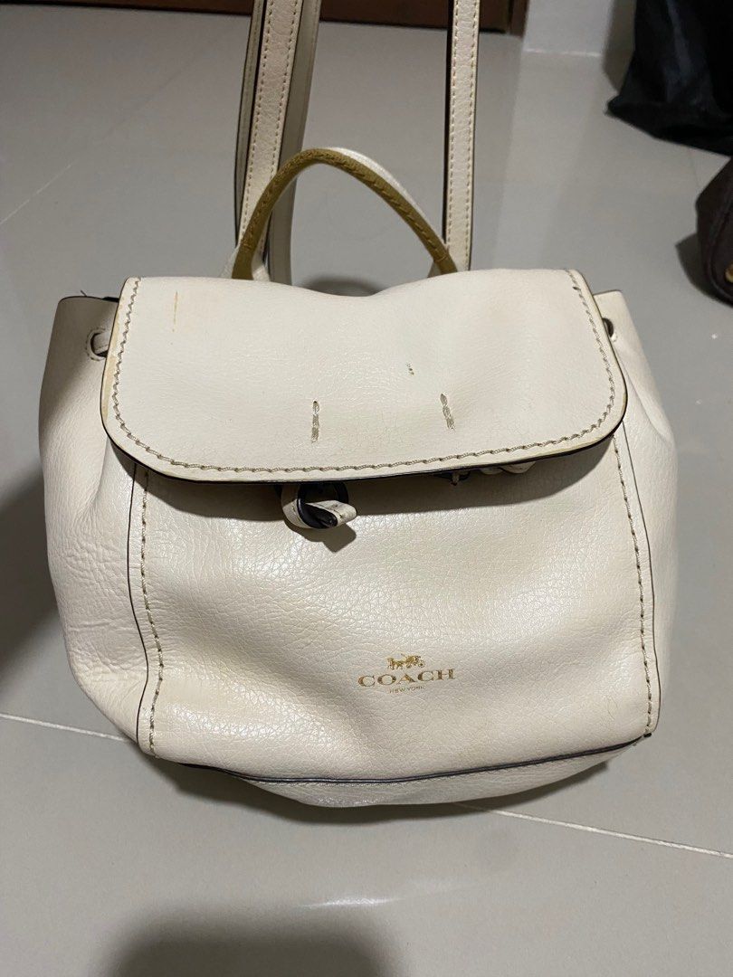 Coach DERBY MINI BACKPACK WITH STRIPE WEBBING (Category: Luxury Bags & Wallets) located in Cavite. Submitted by SunnySkiesAHEADbyMariz (Listing ID 1368925148, Image 1). Description: Very Classy Like new never been used for a long time stored safely DERBY BACKPACK WITH STRIPE WEBBING (COACH F59401) CHALK/NEUTRAL/LIGHT GOLD COACH STYLE # F59401 Details Pebble leather Inside zip pocket Flap closure Top handle with 2 3/4" drop Adjustable shoulder str
