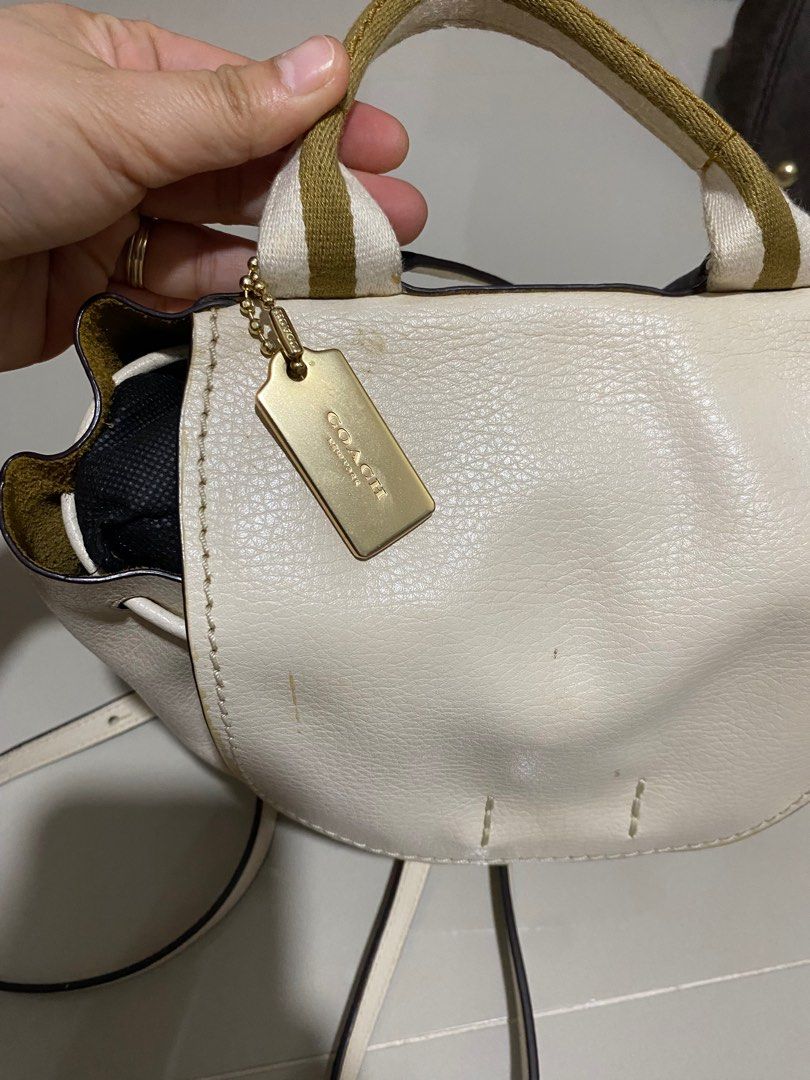 Coach DERBY MINI BACKPACK WITH STRIPE WEBBING (Category: Luxury Bags & Wallets) located in Cavite. Submitted by SunnySkiesAHEADbyMariz (Listing ID 1368925148, Image 3). Description: Very Classy Like new never been used for a long time stored safely DERBY BACKPACK WITH STRIPE WEBBING (COACH F59401) CHALK/NEUTRAL/LIGHT GOLD COACH STYLE # F59401 Details Pebble leather Inside zip pocket Flap closure Top handle with 2 3/4" drop Adjustable shoulder str
